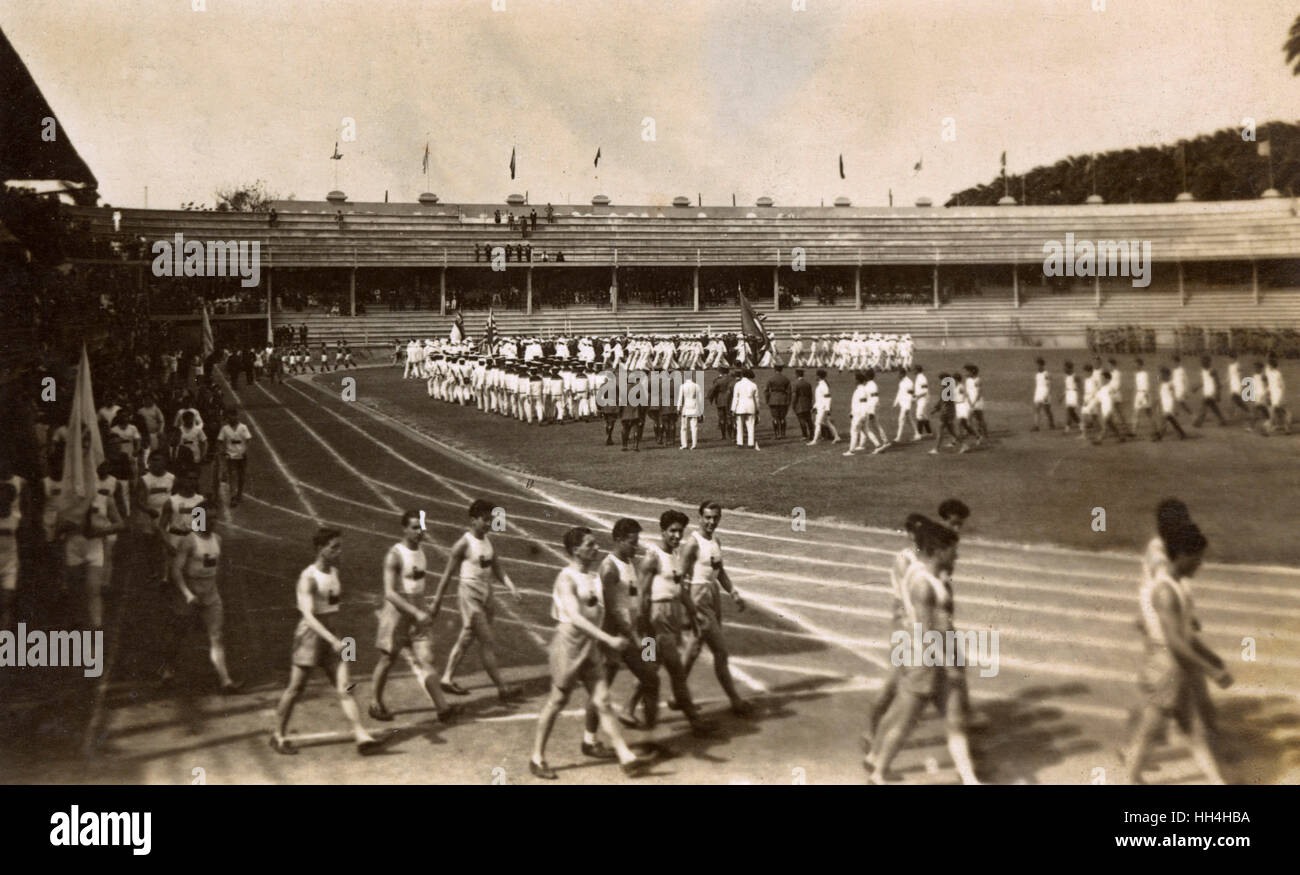 Royal Navy personnel from the warships HMS Hood and HMS Repulse at the Laranjeiras Stadium (football ground of Fluminense FC), Rio de Janeiro, Brazil. They were there for the Goodwill Olympics, September 1922. Also participating were personnel of the Braz Stock Photo