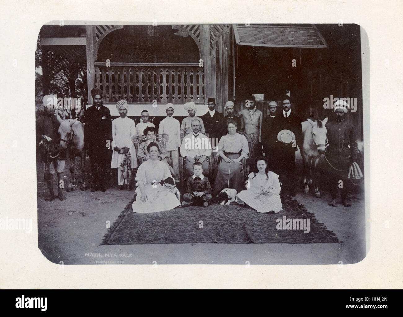 Group photo, doctor's family and staff at Florrie Villa, Mandalay, Burma. Stock Photo