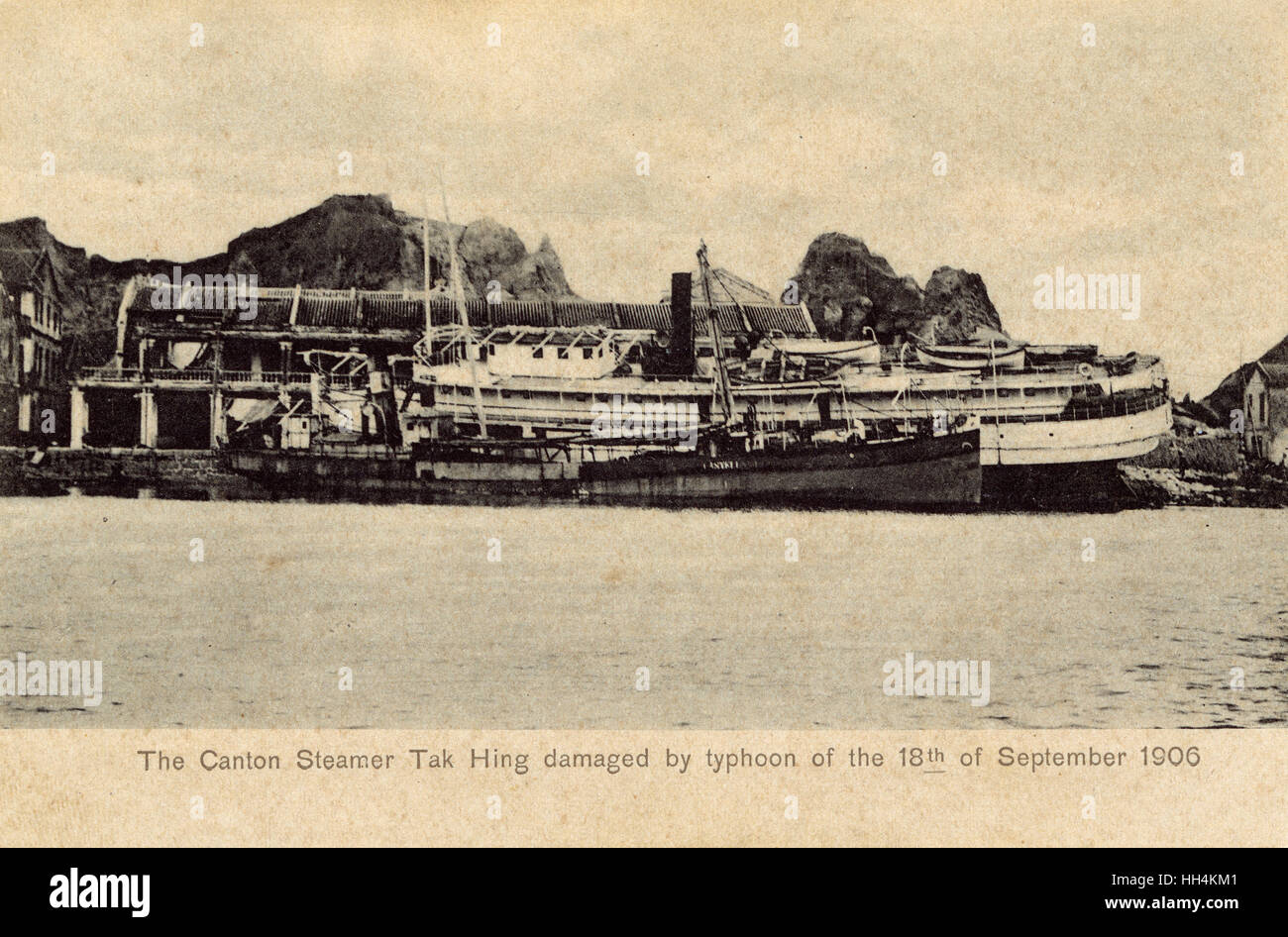 The Canton Steamer Tak Hing run aground and damaged during the Typhoon of 18th September 1906 at Hong Kong. Stock Photo