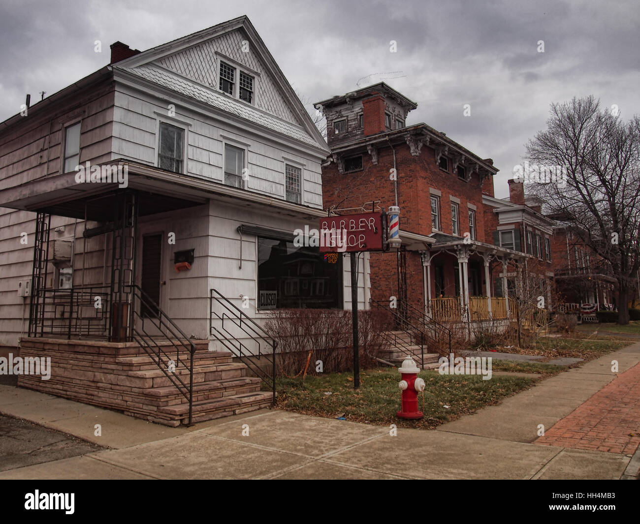 barber shop and old fashioned homes Stock Photo Alamy