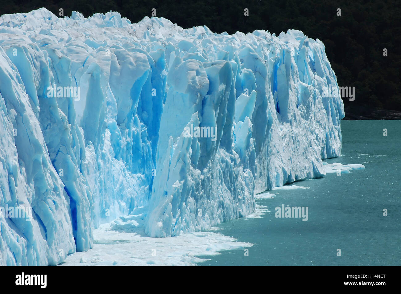 Deep blue ice of the cracking Perito Moreno Glacier, Patagonia, Argentina Stock Photo