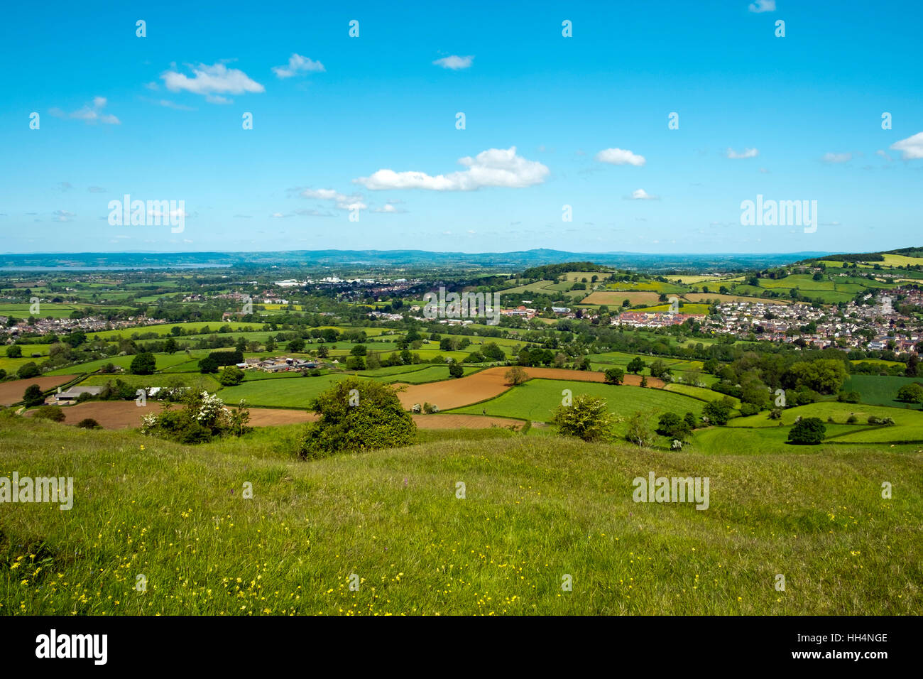 Extensive view from Selsley Common over a patchwork of fields in The Severn Vale, Gloucestershire, UK. Stock Photo