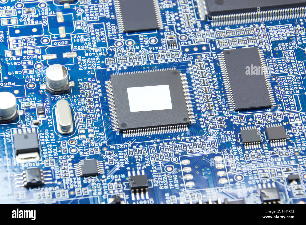 Closed up printed circuit board with electronics components Stock Photo