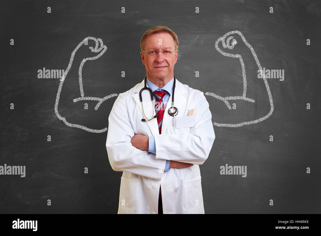 Strong successful doctor concept with muscles made with chalk on