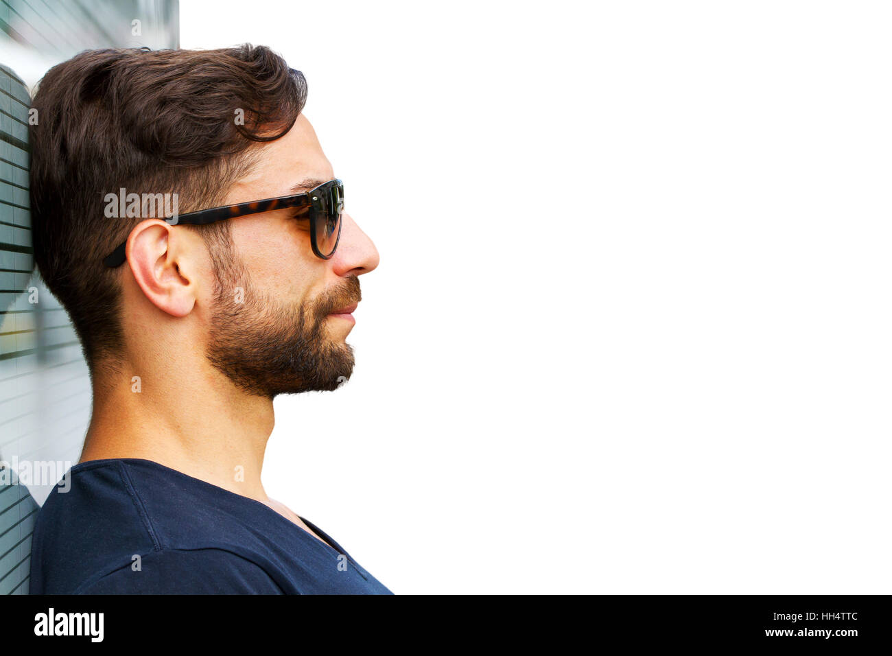 Portrait of a young man with sunglasses Stock Photo - Alamy