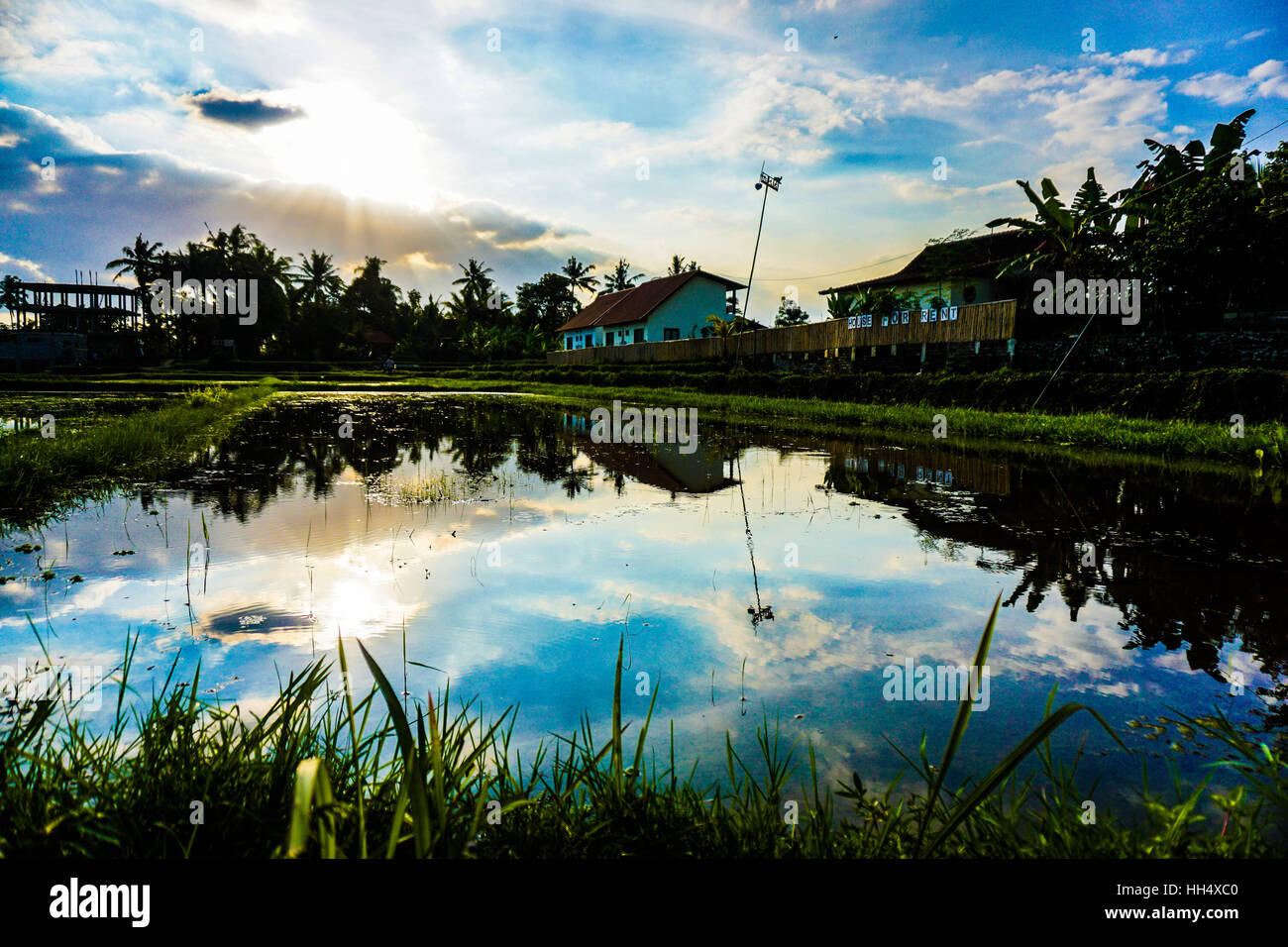 Cloudy sky reflected in water hi-res stock photography and images - Alamy