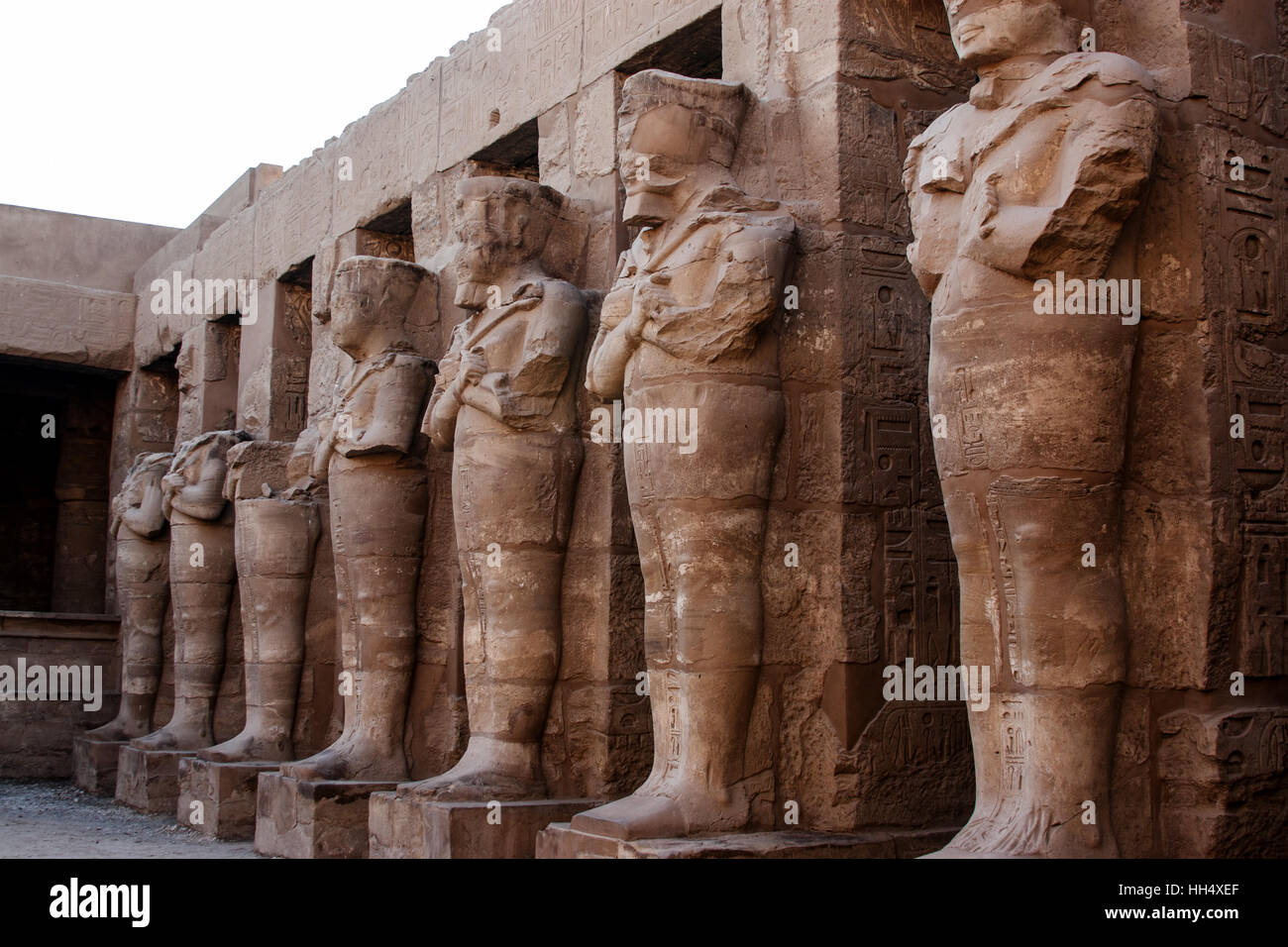 Karnak, Luxor, Egypt  is a huge temple site with preserved ancient ruins hosts rows of giant statuary Stock Photo