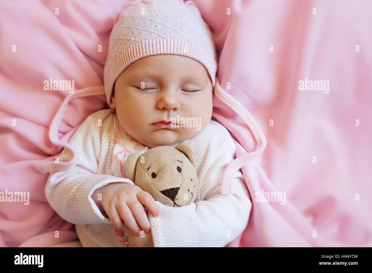 cute baby sleeping with teddy