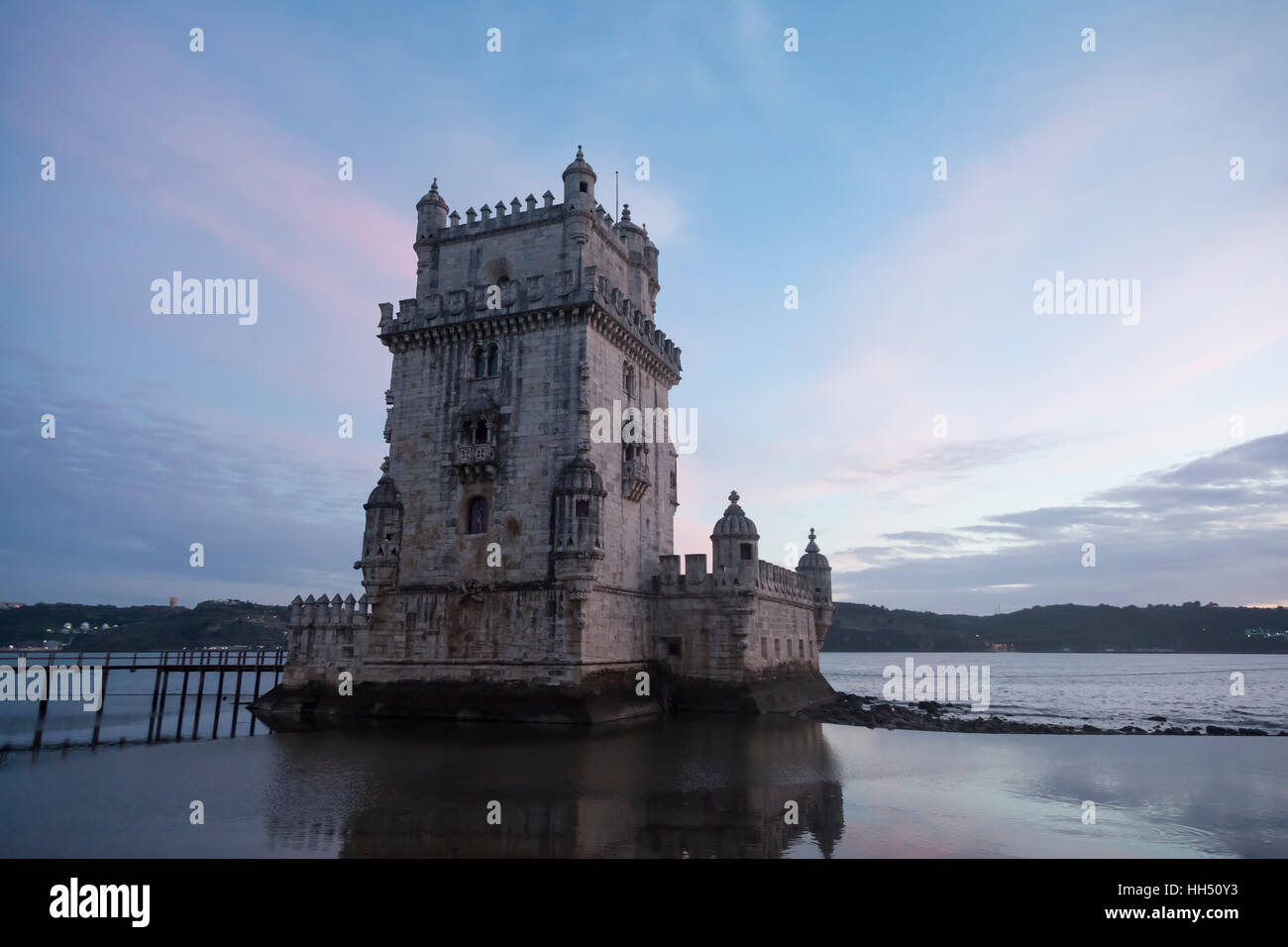 Lisbon, Portugal: Belém Tower on the bank of the Tagus River. The 16th century fortification is a prominent example of the Portuguese Manueline style. Stock Photo