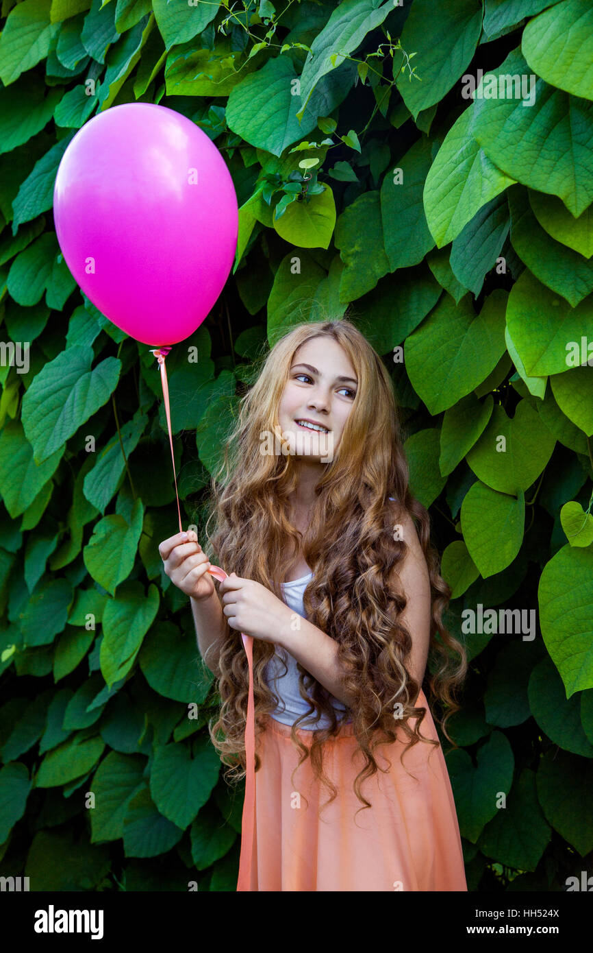 Beautiful girl with balloon have a fun in the park Stock Photo Alamy