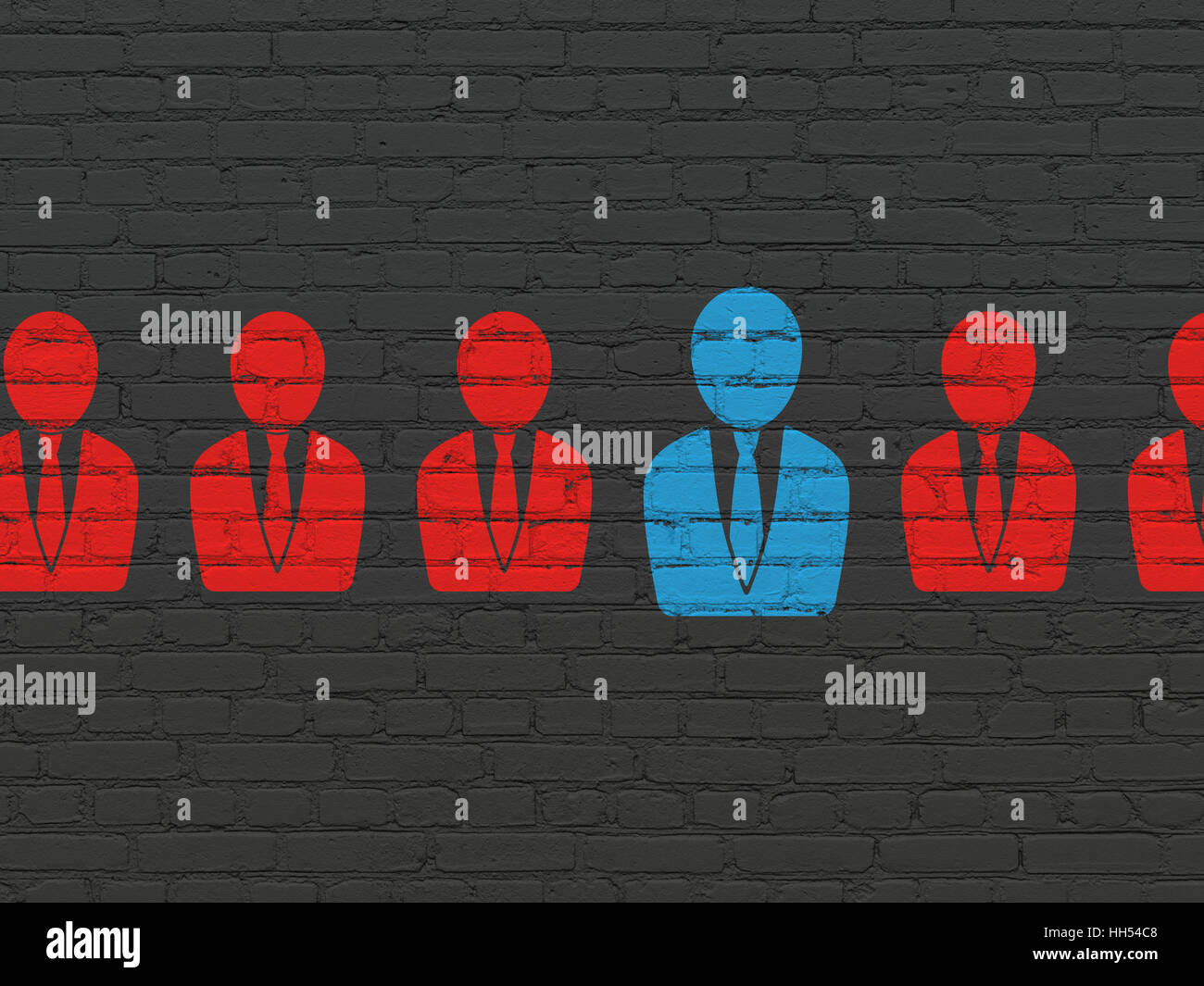Finance concept: business man icon on wall background Stock Photo - Alamy