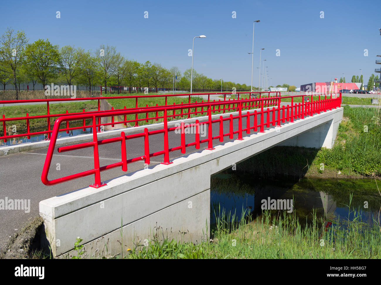 Small Bridge Railing small pedestrian bridge with a red metal railing Stock Photo - Alamy