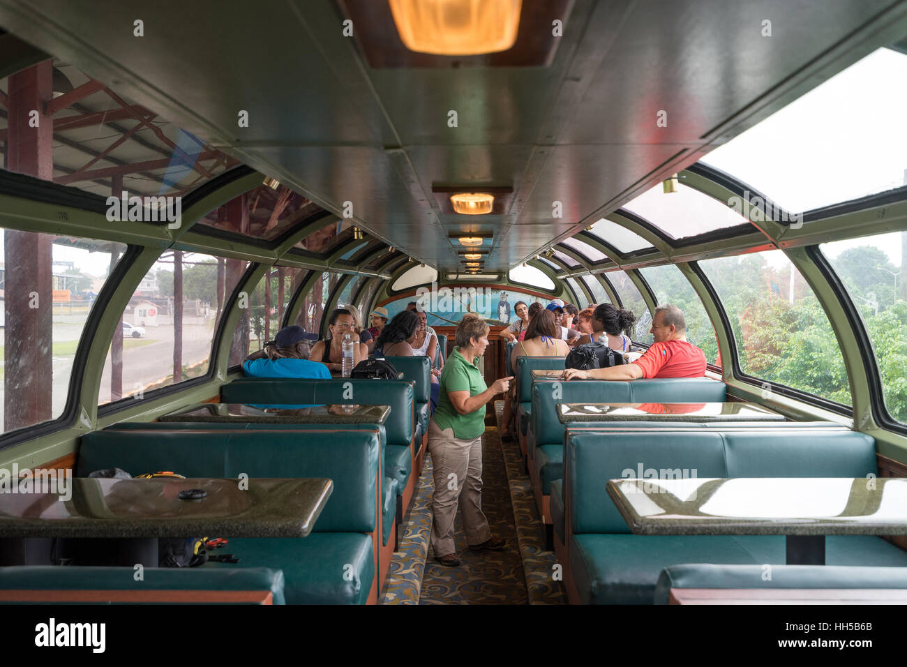 June 28, 2016 Colon, Panama: tourists on the Panama Railway train taking the trip between Colon and Panama City Stock Photo