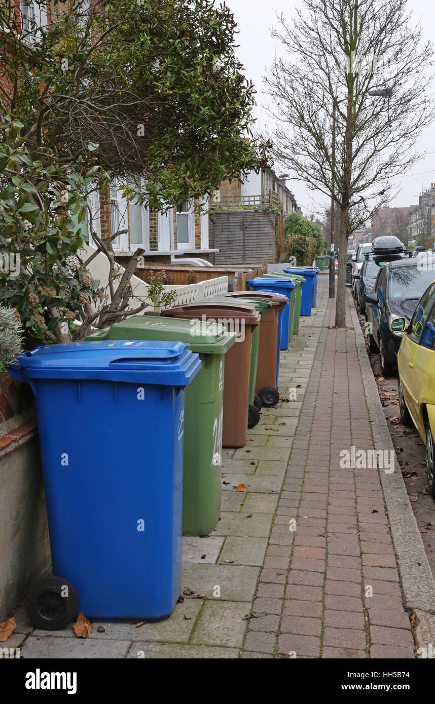 Multiple wheeliebins for recycled domestic waste clog a South London