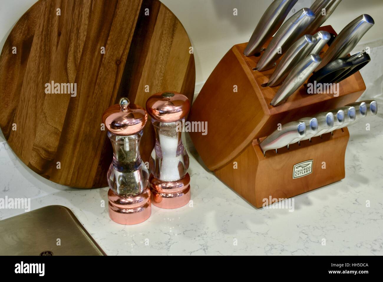 Modern kitchen counter with knife set, salt and pepper shaker, and a
