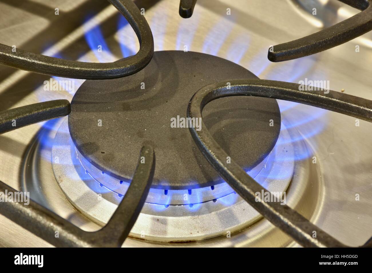 A stove top gas burner running with flames Stock Photo Alamy