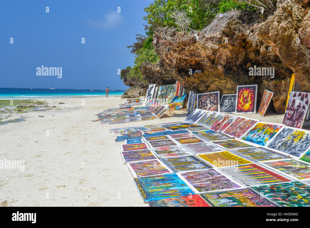 Zanzibar art, selling on the beach, next to blue ocean Stock Photo