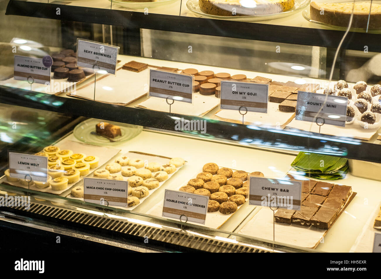 Showcase of vegan cakes in a vegan Restaurant, Ubud, Bali, Indonesia Stock Photo