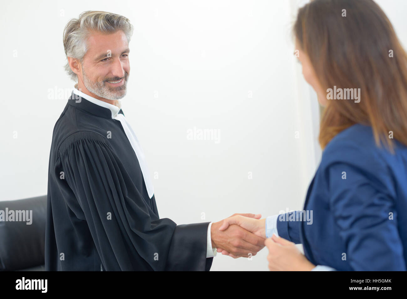 judge shaking hands Stock Photo Alamy