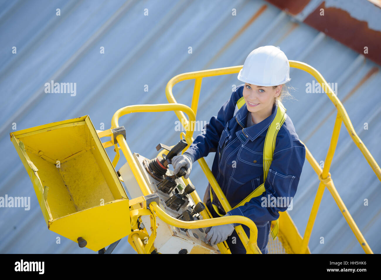 Woman in cherry picker bucket Stock Photo Alamy