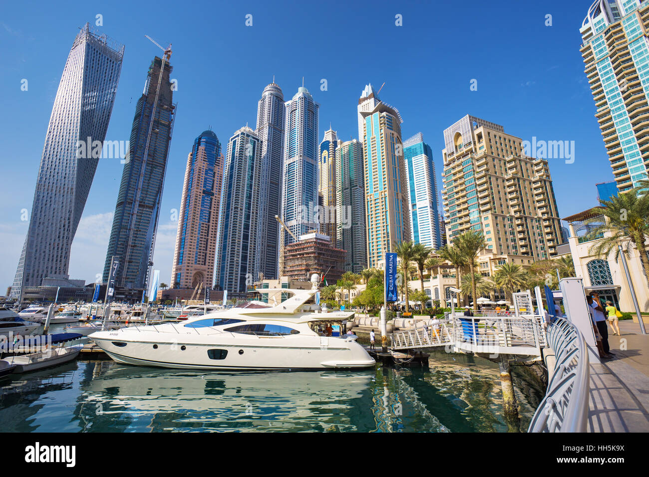 DUBAI MARINA,UNITED ARAB EMIRATES-MARCH 5, 2016: View on Dubai Marina with luxury boats and yachts,Dubai,United Arab Emirates Stock Photo