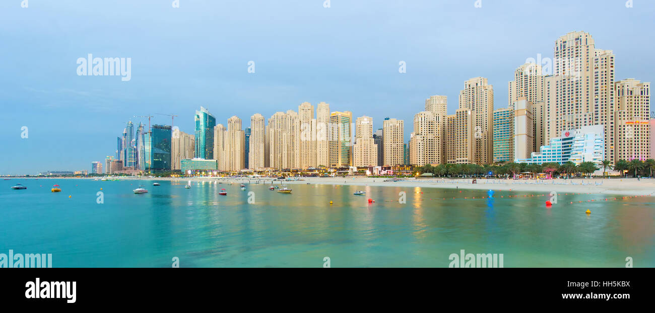 DUBAI,UNITED ARAB EMIRATES-MARCH 7, 2016:View on luxury Dubai Marina skyscrapers and the Jumeirah beach in Dubai,United Arab Emirates Stock Photo