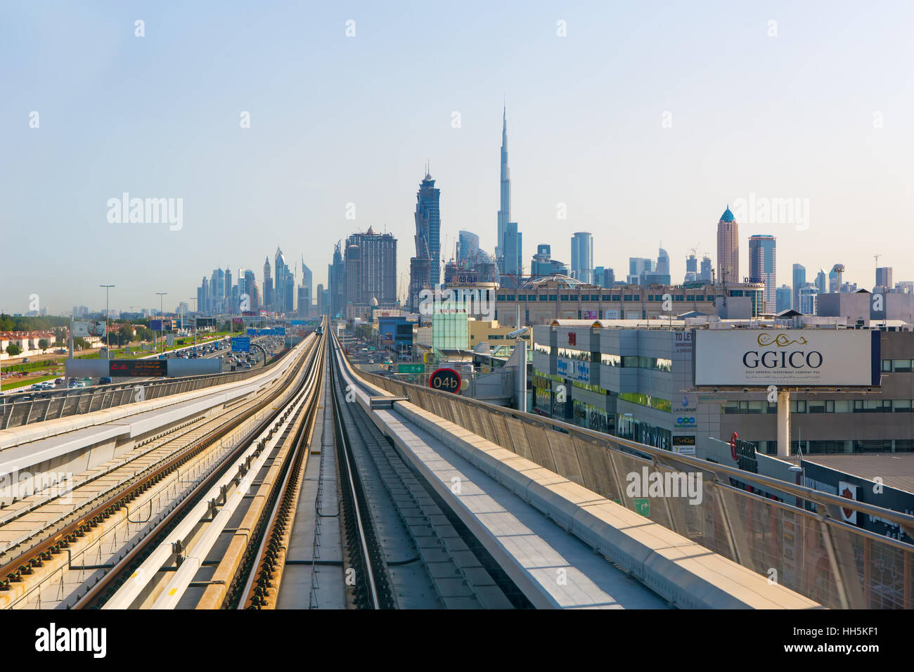 DUBAI,UNITED ARAB EMIRATES-MARCH 10, 2016:View on modern skyscrapers and metro railway in Dubai city Stock Photo