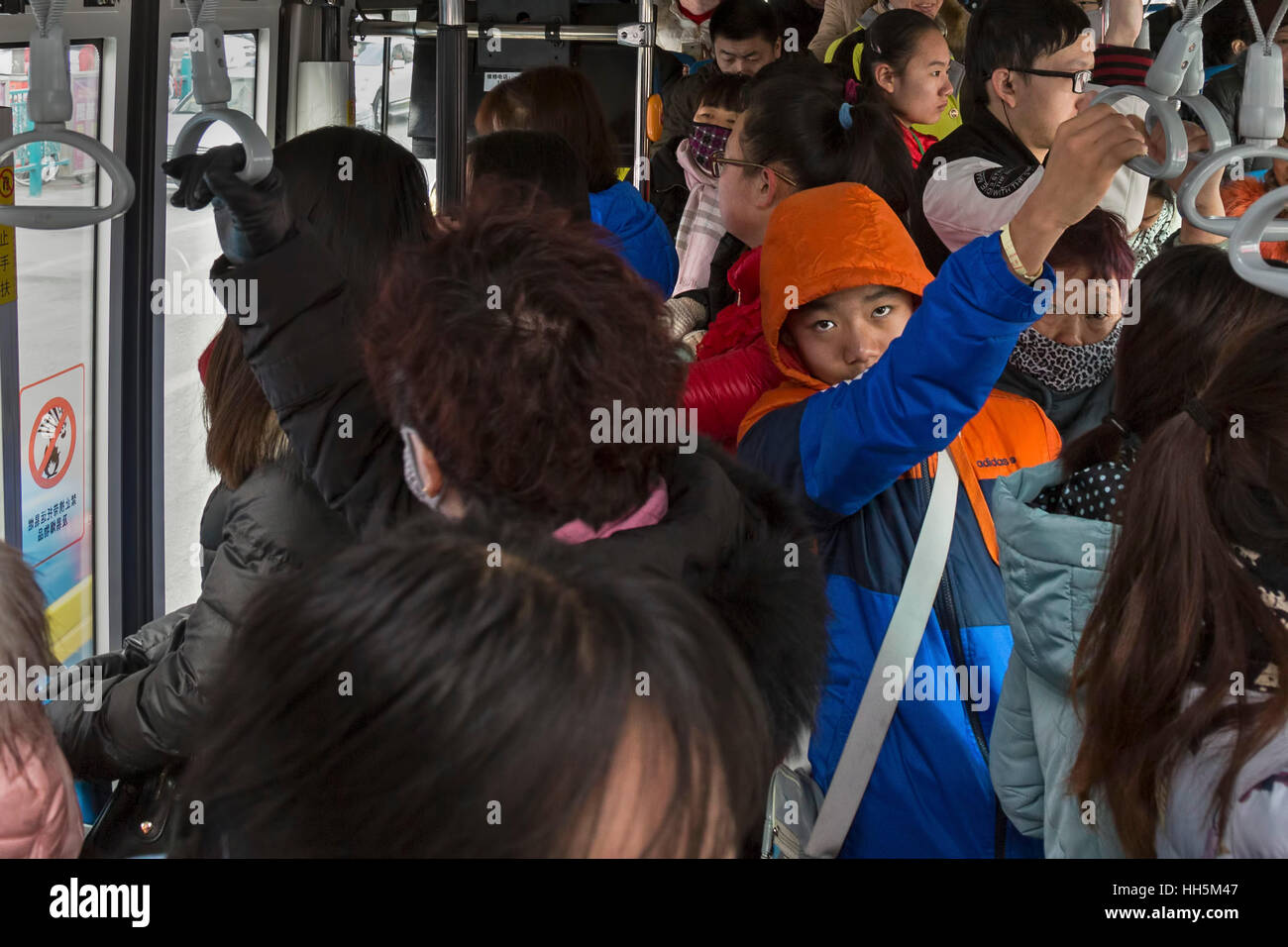 Passengers on a bus, Yinchuan, Ningxia province, China Stock Photo
