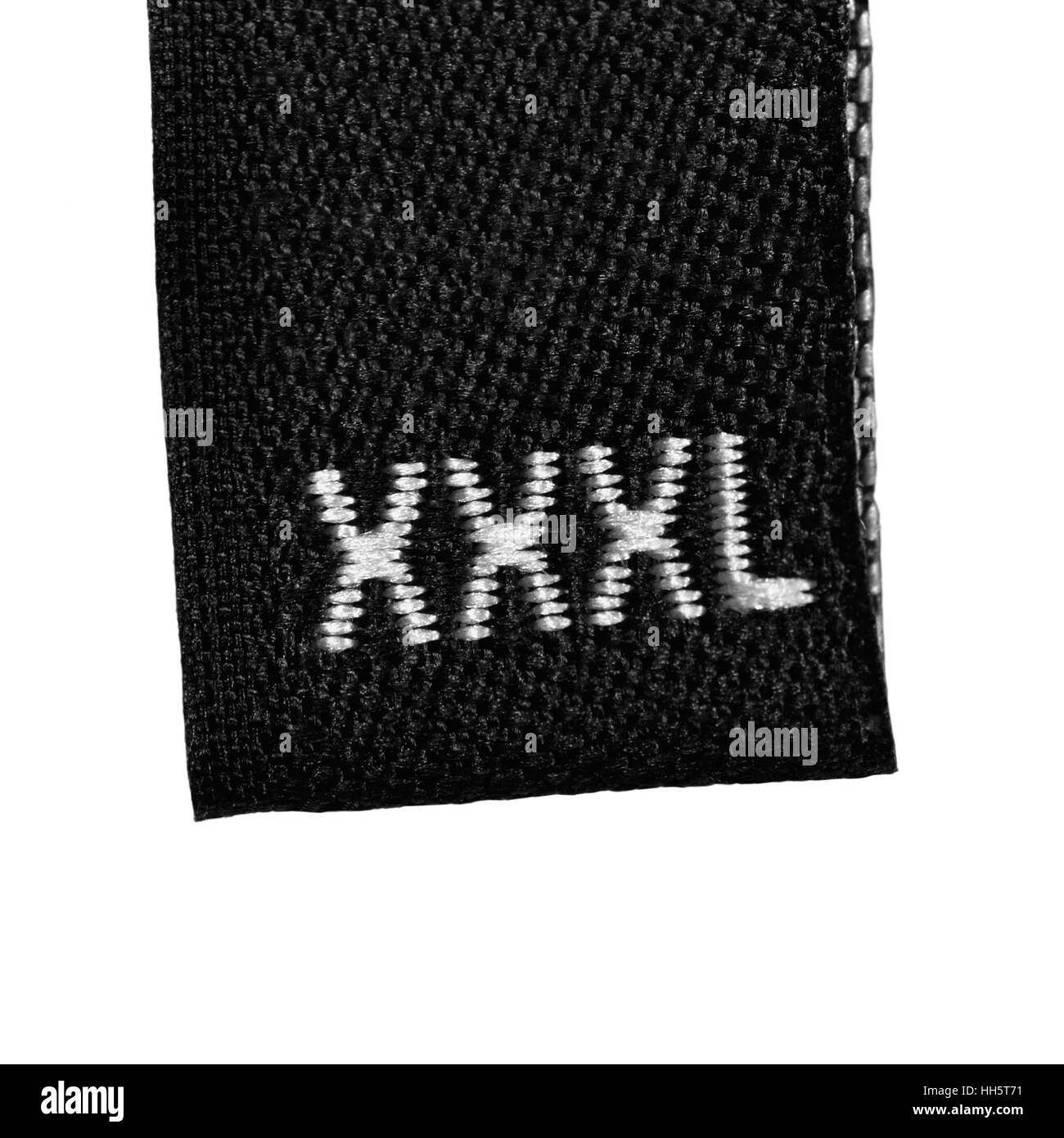 XXXL size clothing label tag, black fabric, isolated on white, detailed