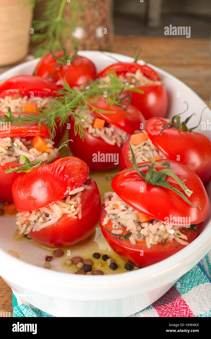 Risotto stuffed tomatoes Stock Photo Alamy