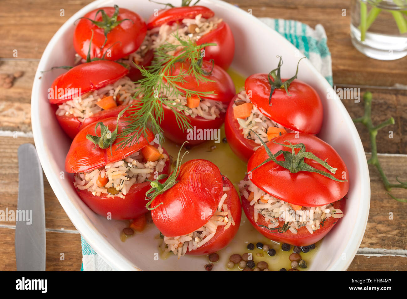 Risotto stuffed tomatoes Stock Photo Alamy