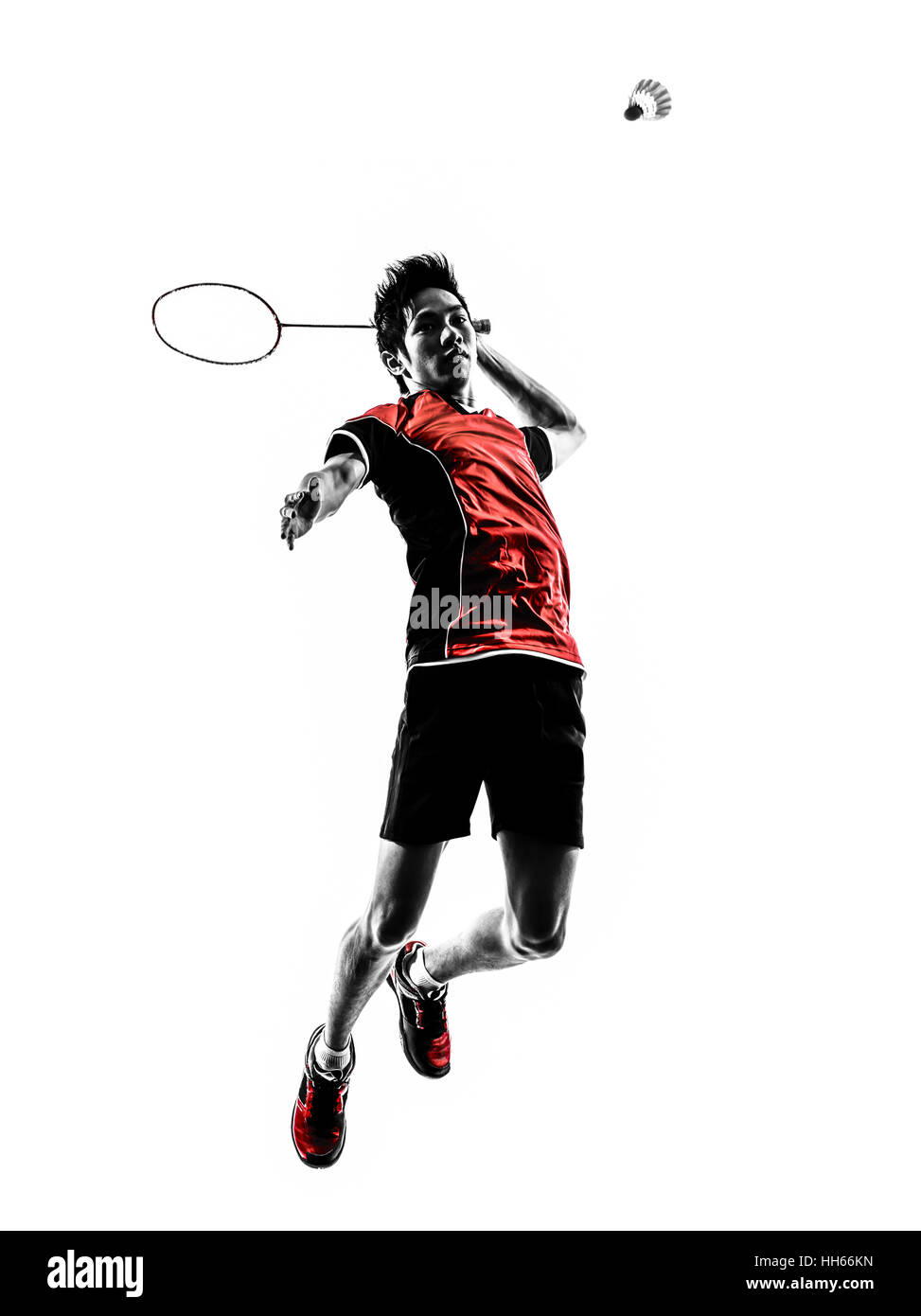 one asian badminton player young man in silhouette isolated white background Stock Photo