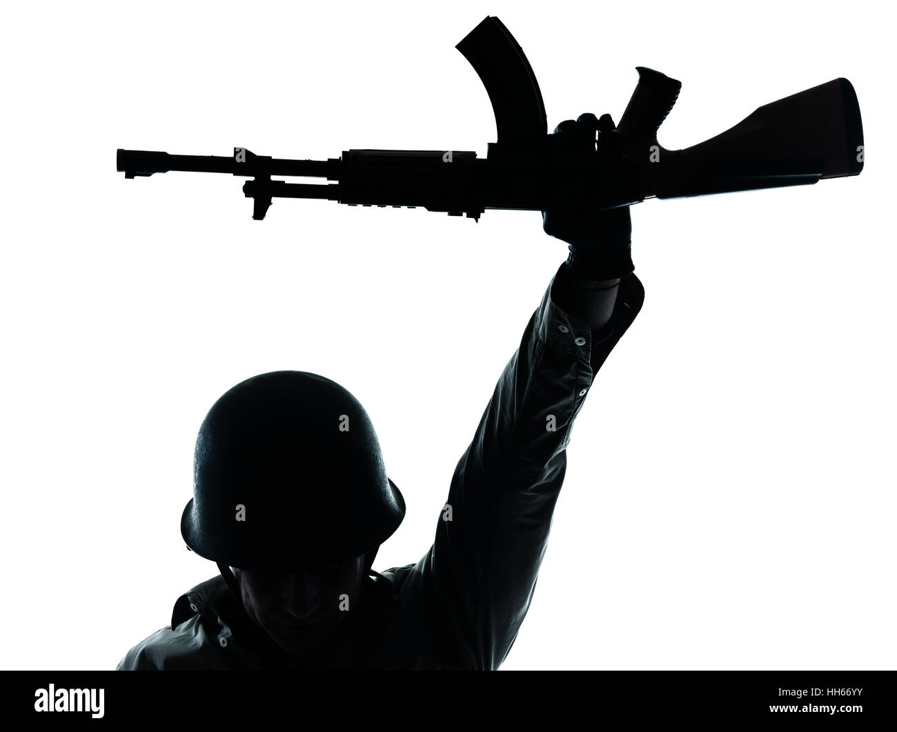 one caucasian revolutionary army soldier man holding ak47 kalachnikov on studio isolated on white background Stock Photo