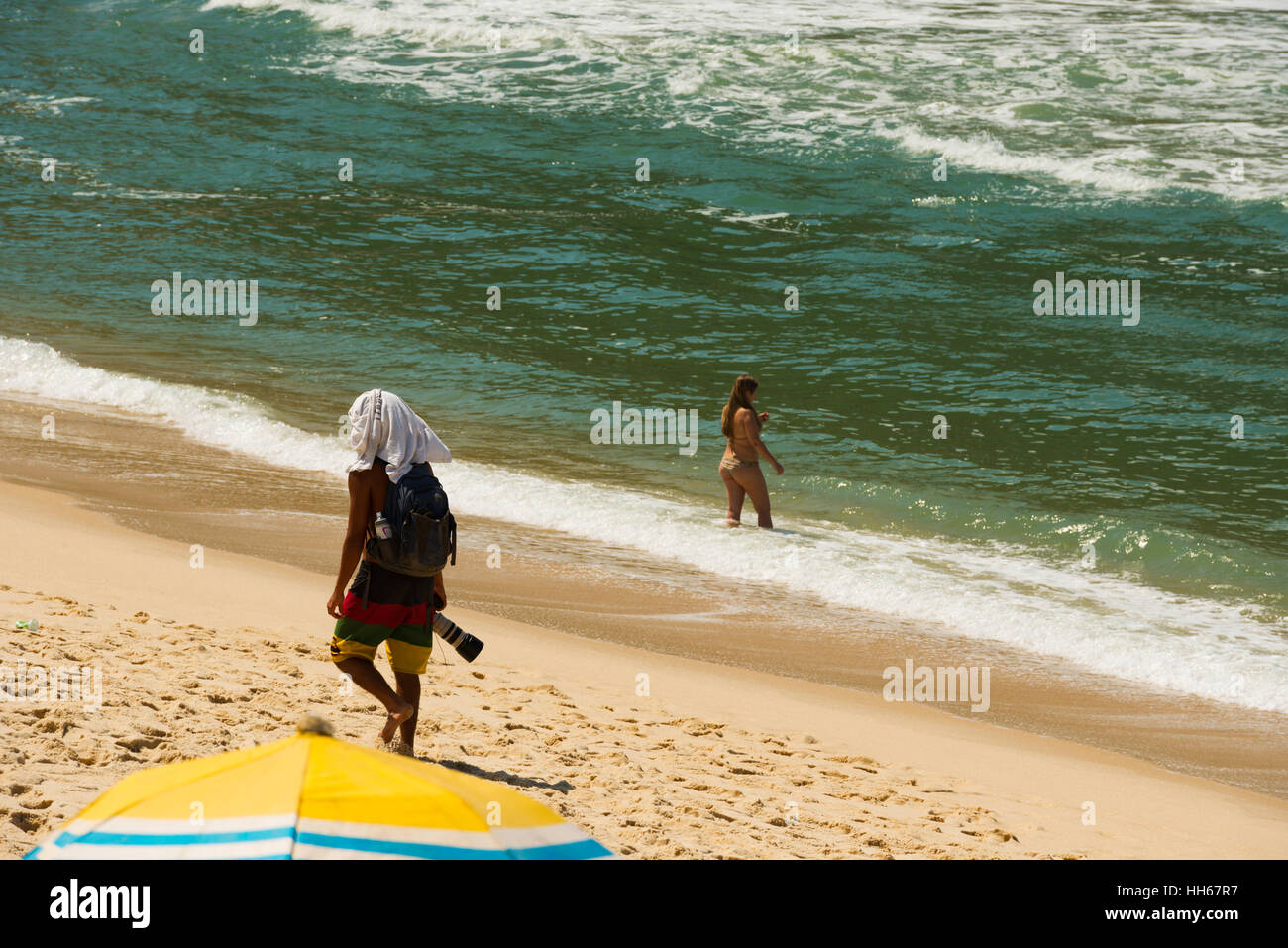 a photographer on a beach, Rio de Janeiro, Brazil Stock Photo