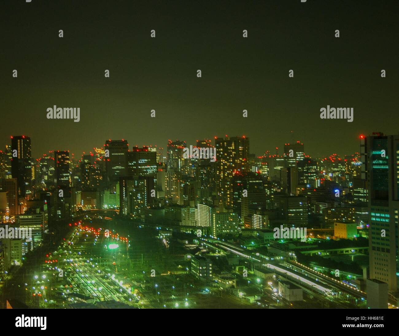 Tokyo lights at night, Tokyo, Japan. In the front left are the tracks