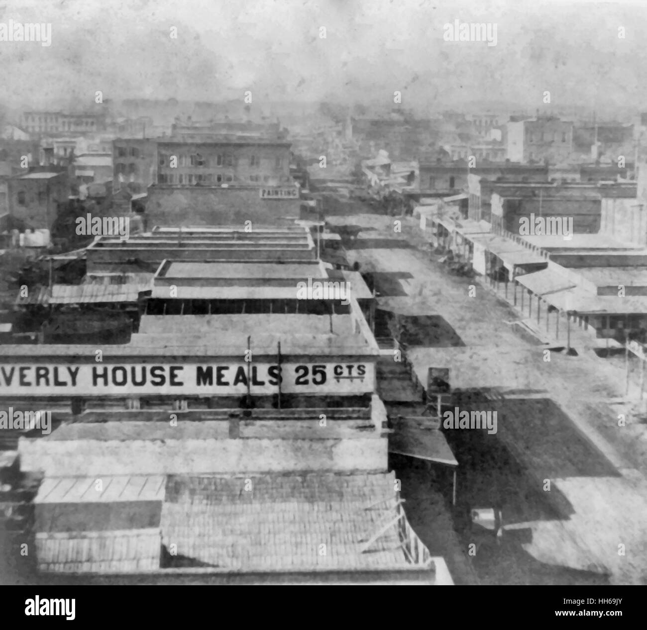 Sacramento City, K Street, looking West from the Masonic Hall - Waverly House Meals 25 cents, several buildings, circa 1866 Stock Photo