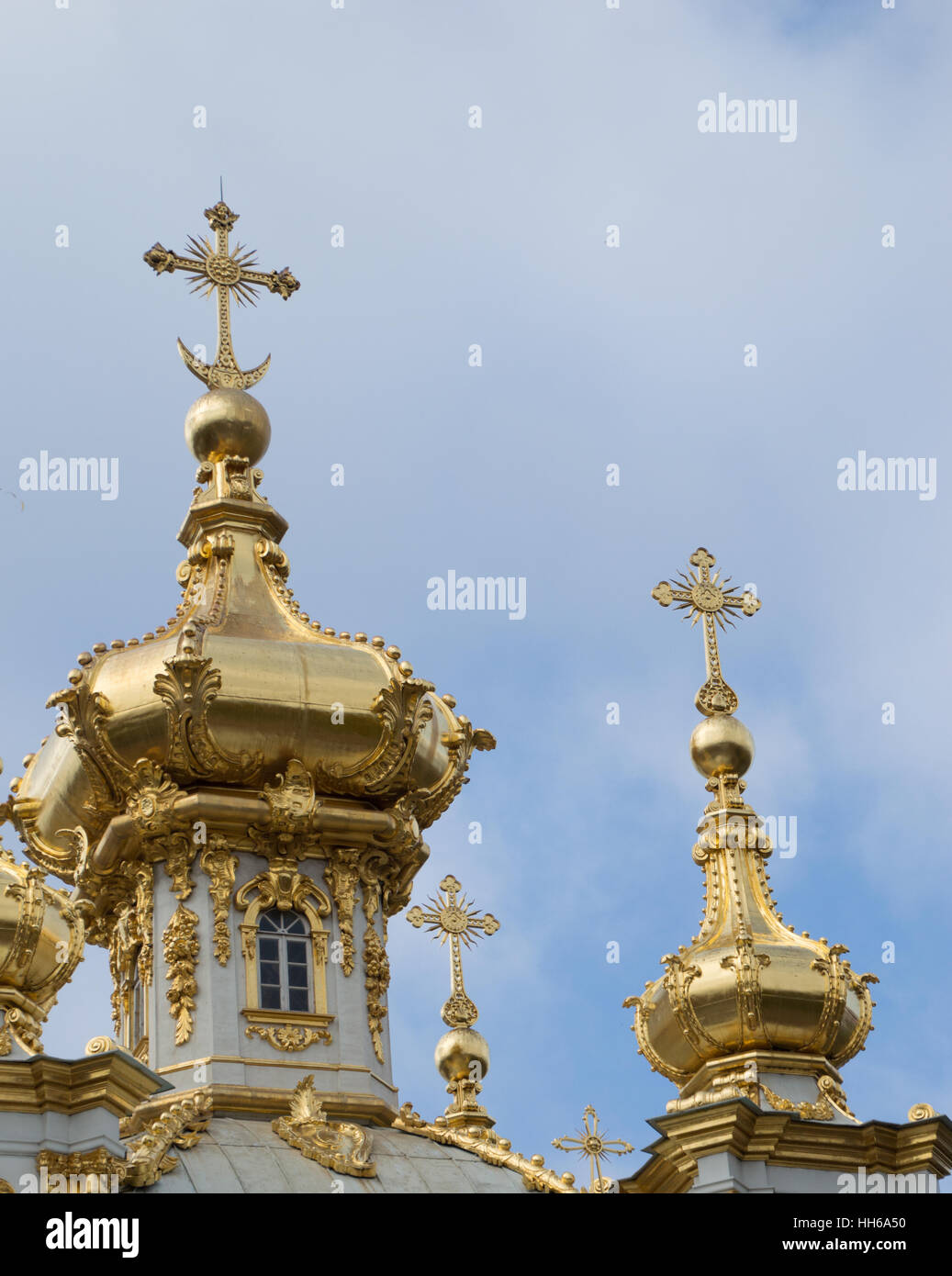 Close up of the gold onion domes on the Palace Chapel at Peterhof Palace. Domes topped with