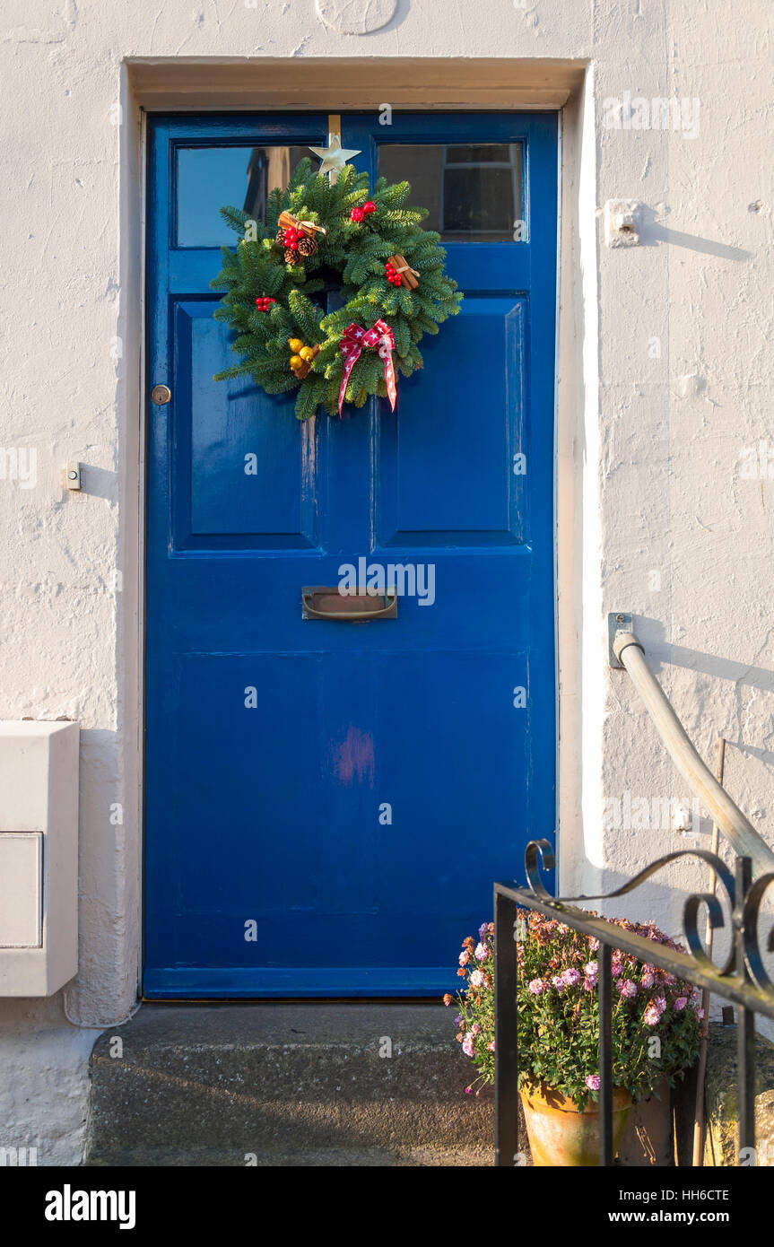 Christmas wreath on front door Stock Photo