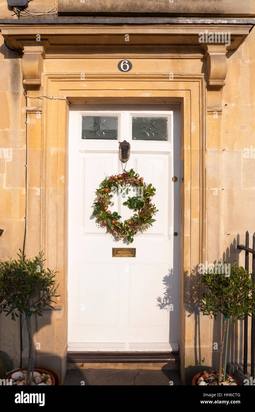 Christmas wreath on front door Stock Photo Alamy