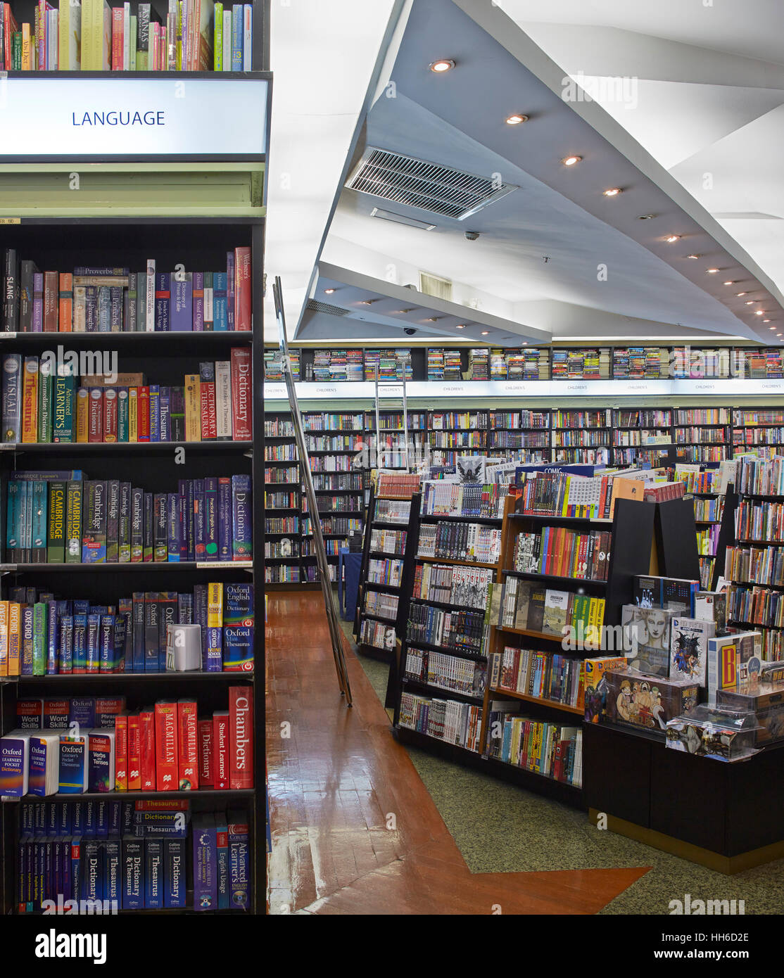 Bookshelves and lighting features. Kinokuniya Bookstore, Bangkok, Bangkok, Thailand. Architect