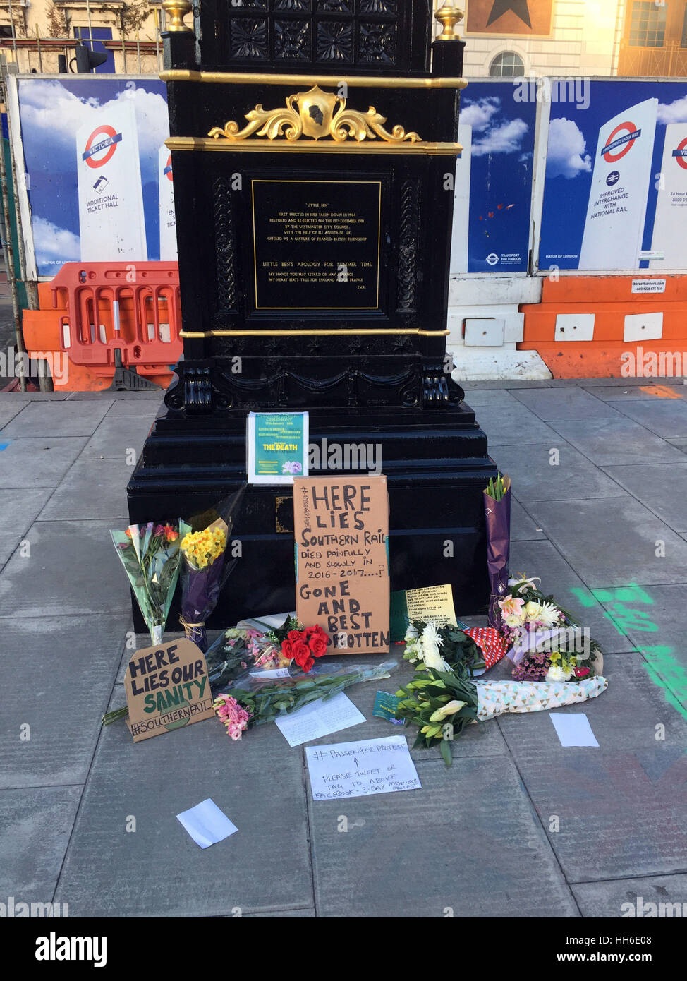 A passenger protest next to the Little Ben clock near Victoria Station in London, where Southern Rail commuters have left floral tributes after hundreds of thousands of passengers were hit by three days of strikes last week and have endured months of disruption because of industrial action, staff shortages and other issues. Stock Photo