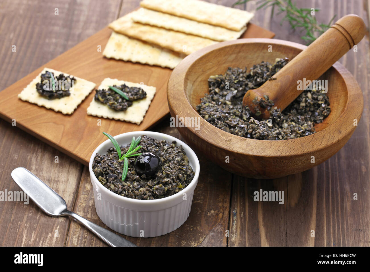 black olive tapenade with crackers Stock Photo Alamy