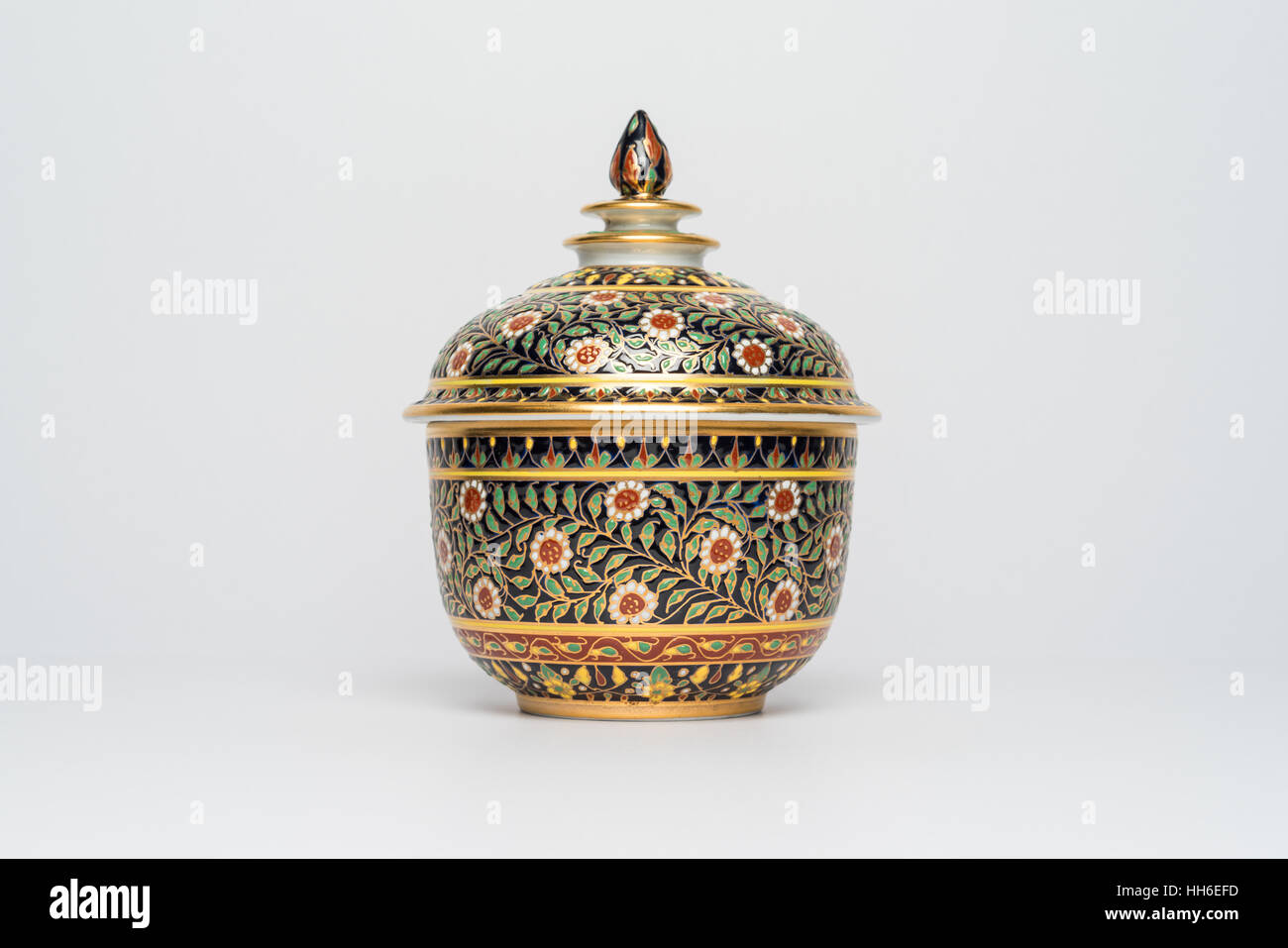 Chinese traditional ceramic vessels pot with Flowers ornament, Isolated. Stock Photo