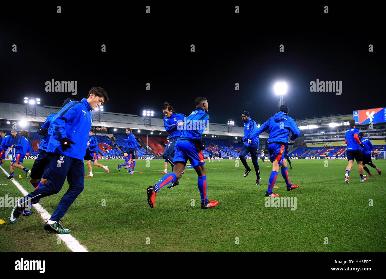 Crystal Palace's players warm up before the Emirates FA Cup, third round replay match at Selhurst Park, London. Stock Photo
