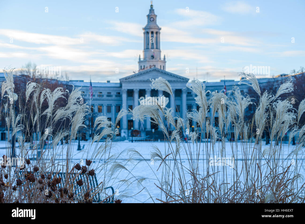 Winter at Denver Civic Center - A cold December evening at Denver Civic Center. The Denver City Hall rising in background. Stock Photo