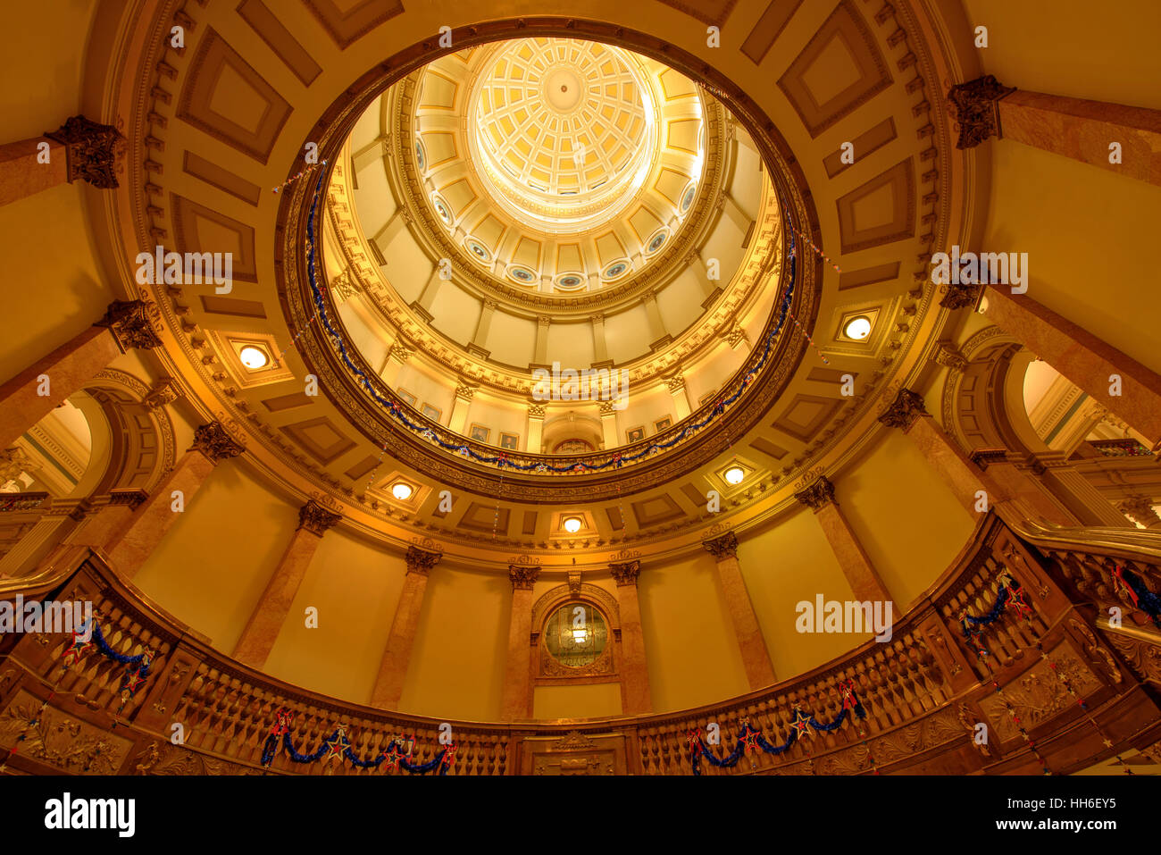 Interior of Gold Dome of Colorado State Capitol Building - A low-angle view of interior Gold Dome and its stair cases. Stock Photo