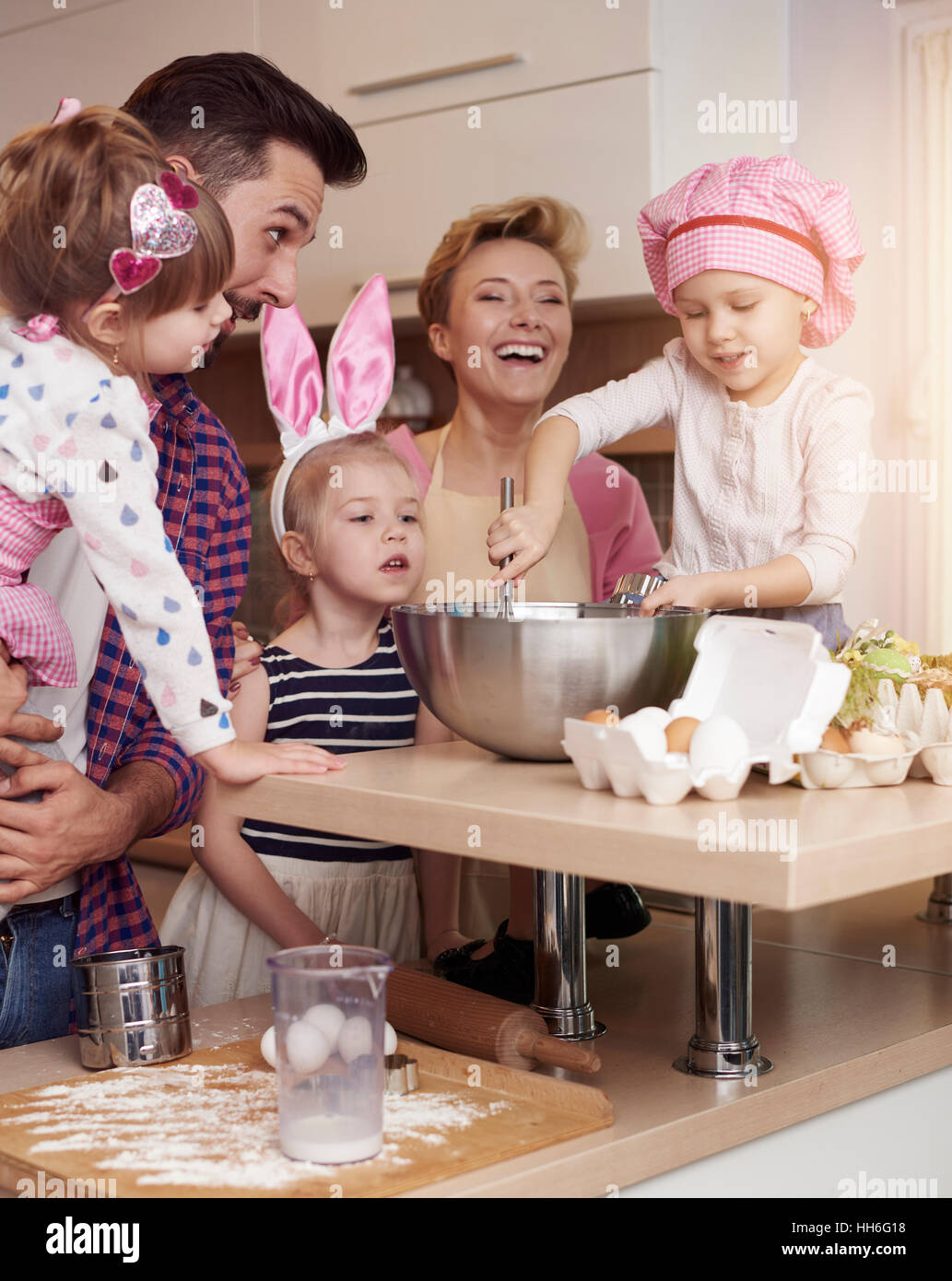 Cheerful family spending time in the kitchen Stock Photo