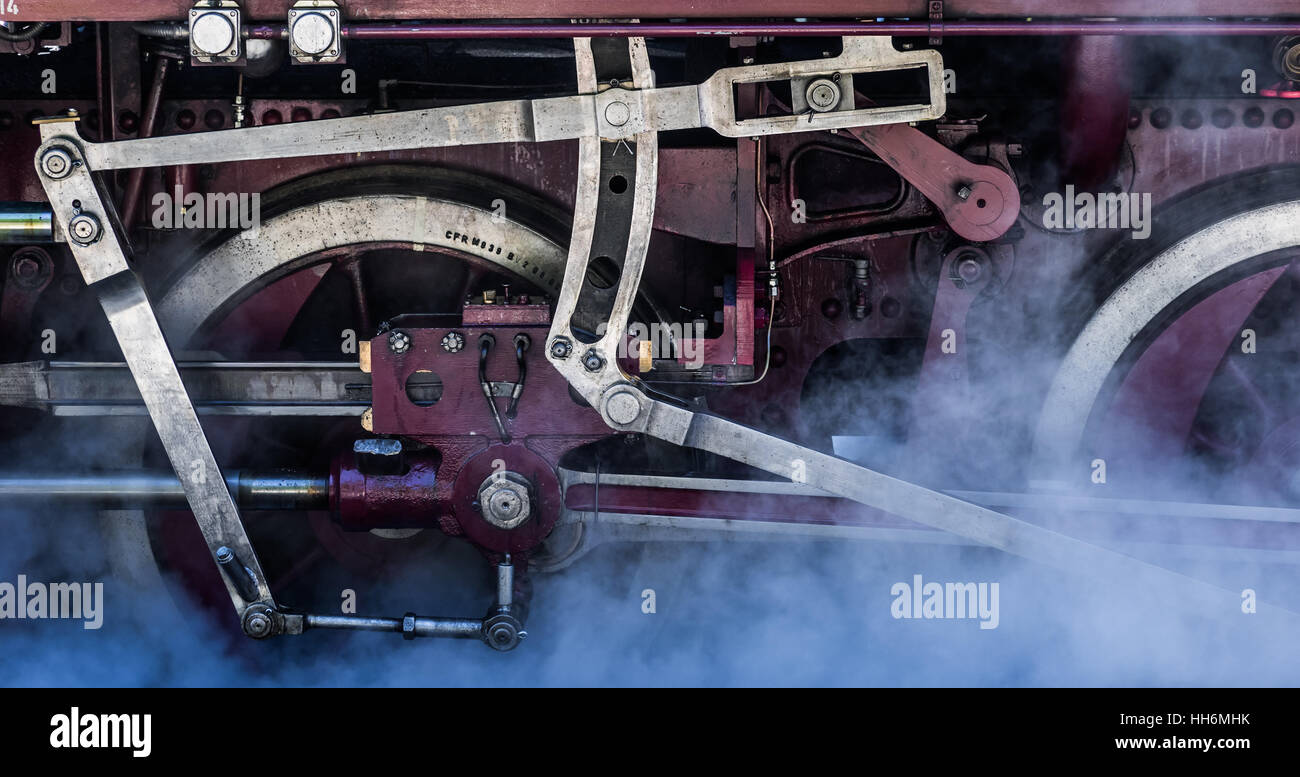 Close-up of a steam locomotive's wheels Stock Photo