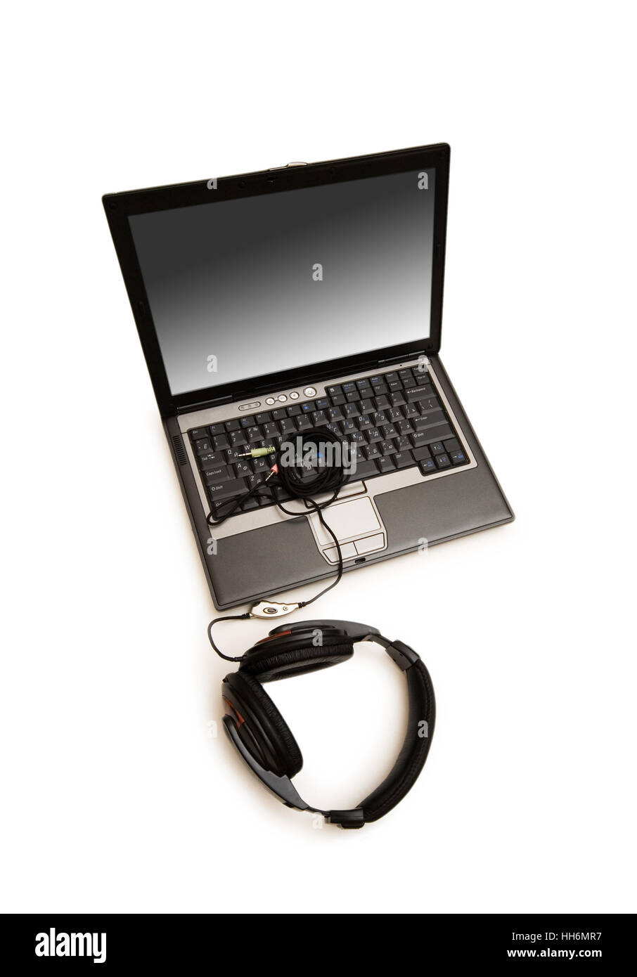 Silver laptop white headphones Cut Out Stock Images & Pictures - Alamy