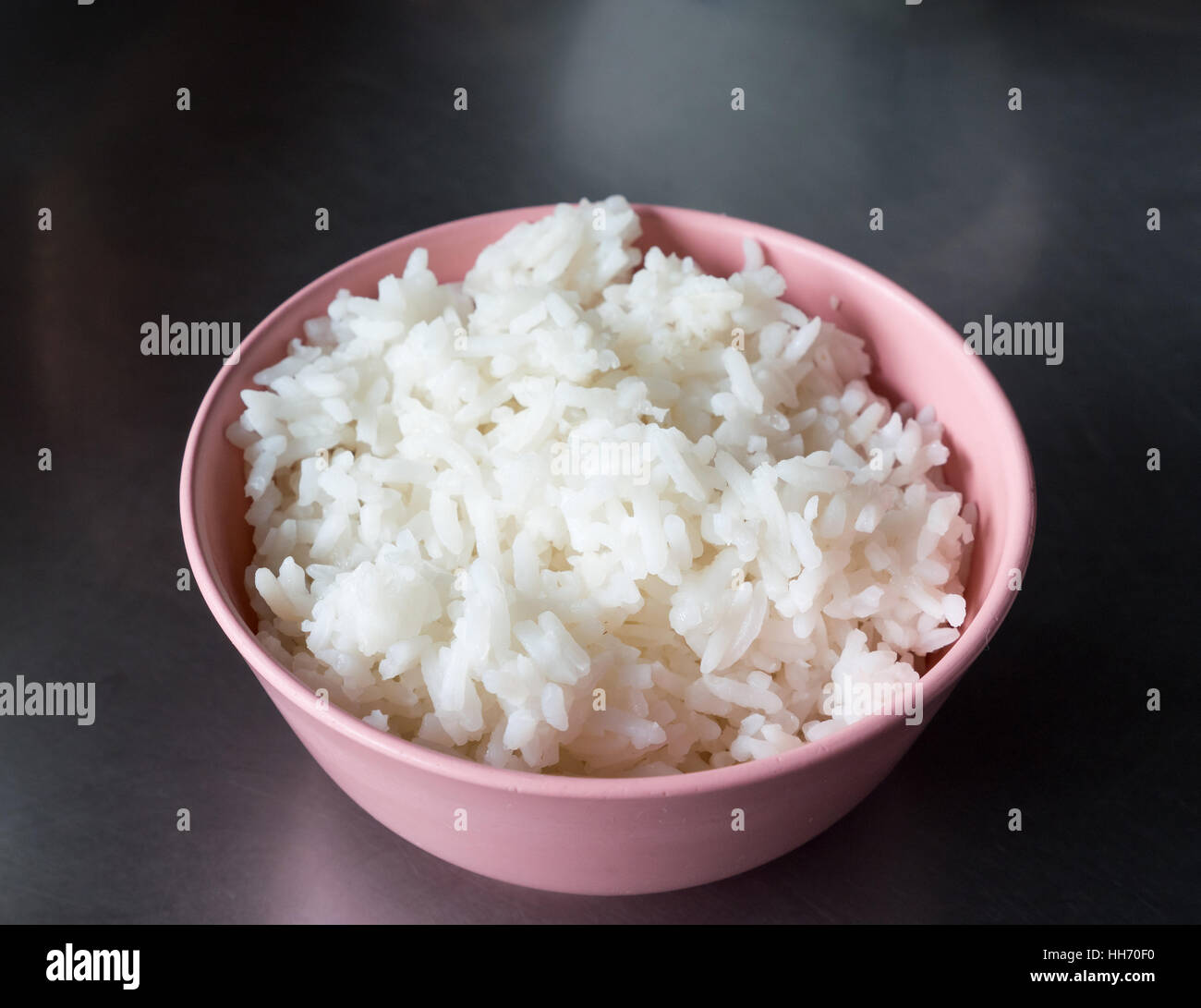 Jasmine rice in the plastic bowl for serve in the Thai restaurant Stock